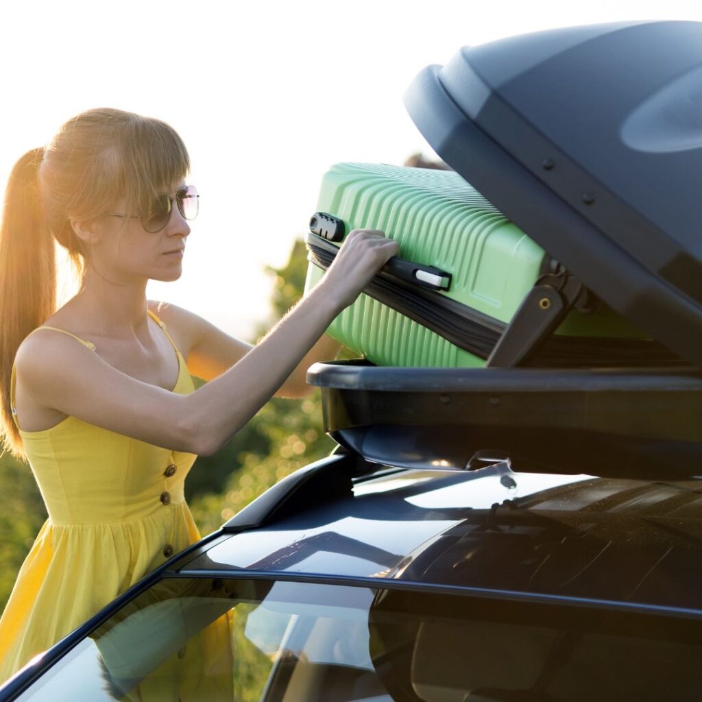 Packing roof top box for a road trip - Livable Solutions