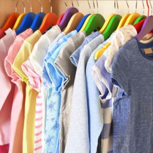 Kids clothing  organized and hung up in closet - Livable Solutions Blog