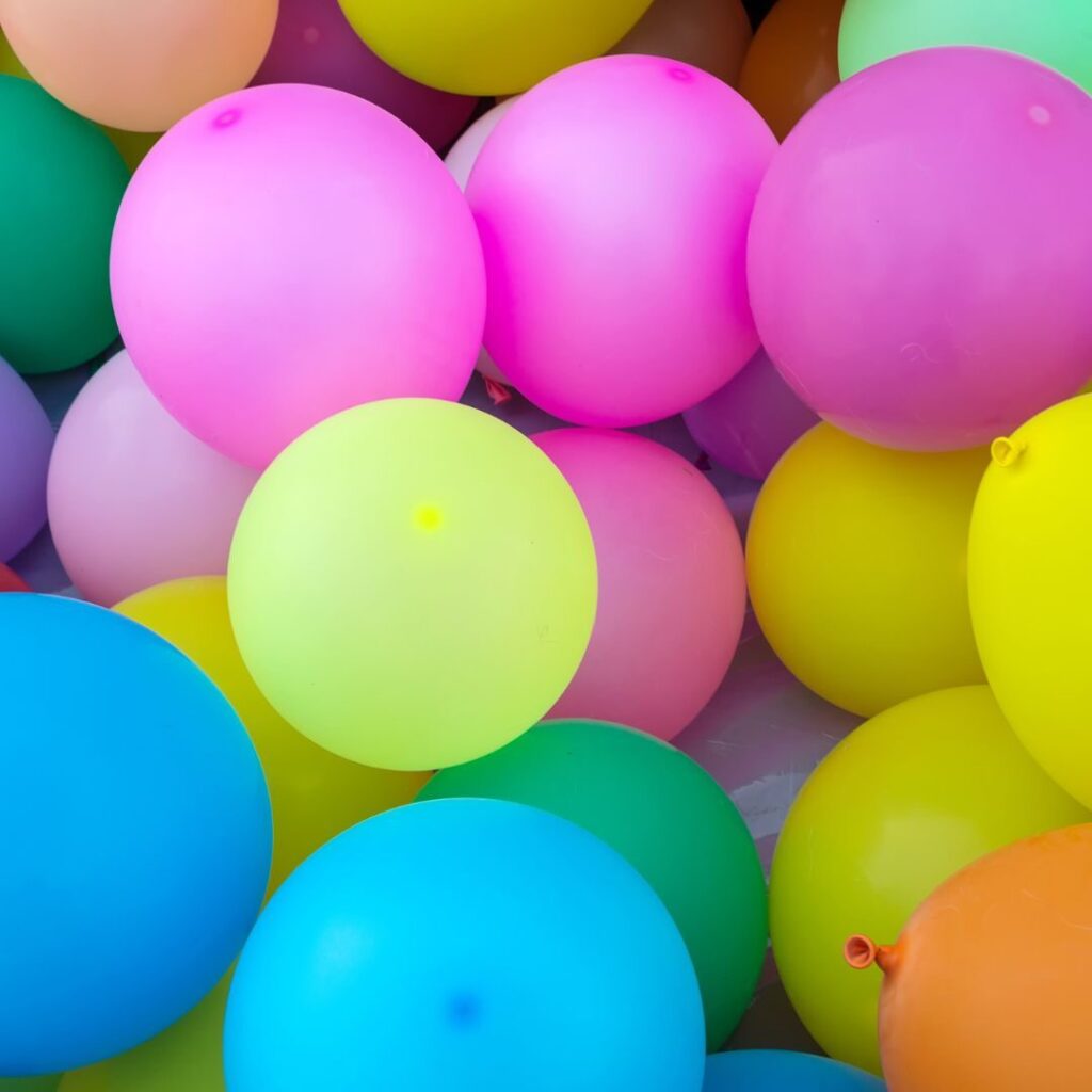 Balloon Pop Challenge Outdoor game ideas from Livable Solutions Professional Organizing